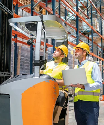 warehouse manager checking the inventory management software