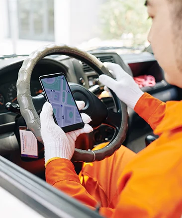 delivery driver checking route on van sales app
