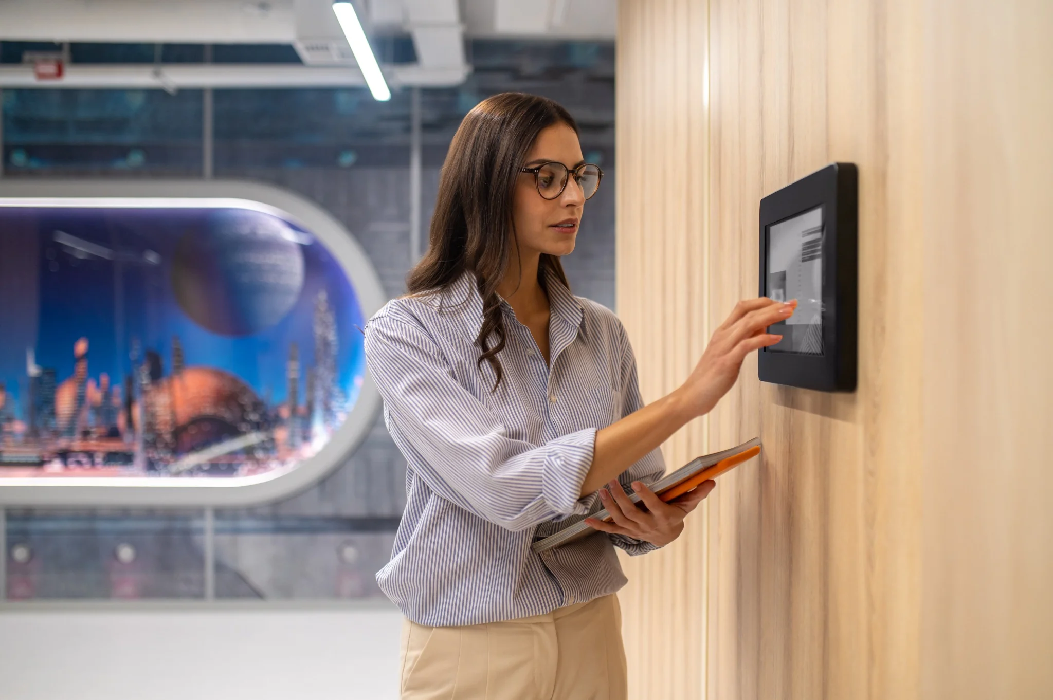 TrueBays StackHX modern biometric time and attendance system in a UAE office environment